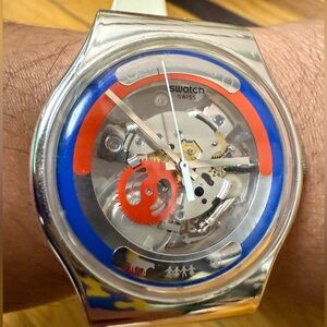 Swatch 25th Anniversary Limited Edition Silver Watch with Blue and Red Accents